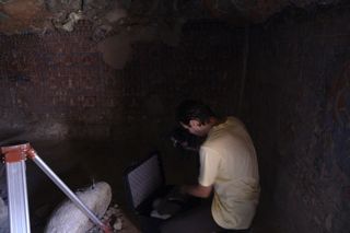Dragos Ene at work in Sasspol cave Dragos Ene at work in Sasspol cave