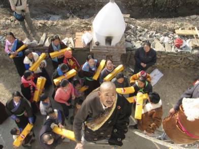 the local community fills the stupa with copies of the Kanjur the local community fills the stupa with copies of the Kanjur